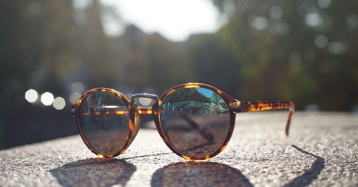 Close-up of stylish tortoiseshell sunglasses outdoors, Berlin.